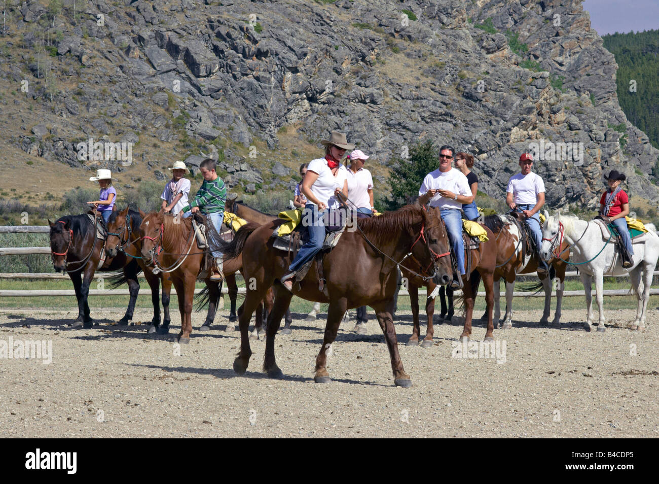 Piloti su cavalli su un North American Dude Ranch Foto Stock