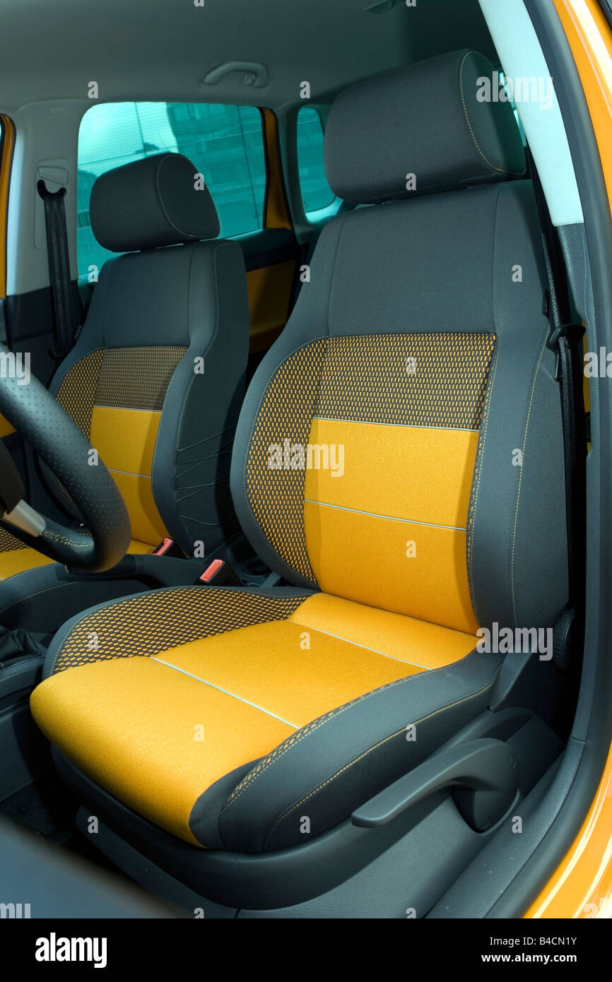 VW Volkswagen Polo trasversale 1.4 TDI, modello anno 2006-, arancione , vista interna, vista interna, sedili, sedile anteriore, sedile conducente , te Foto Stock