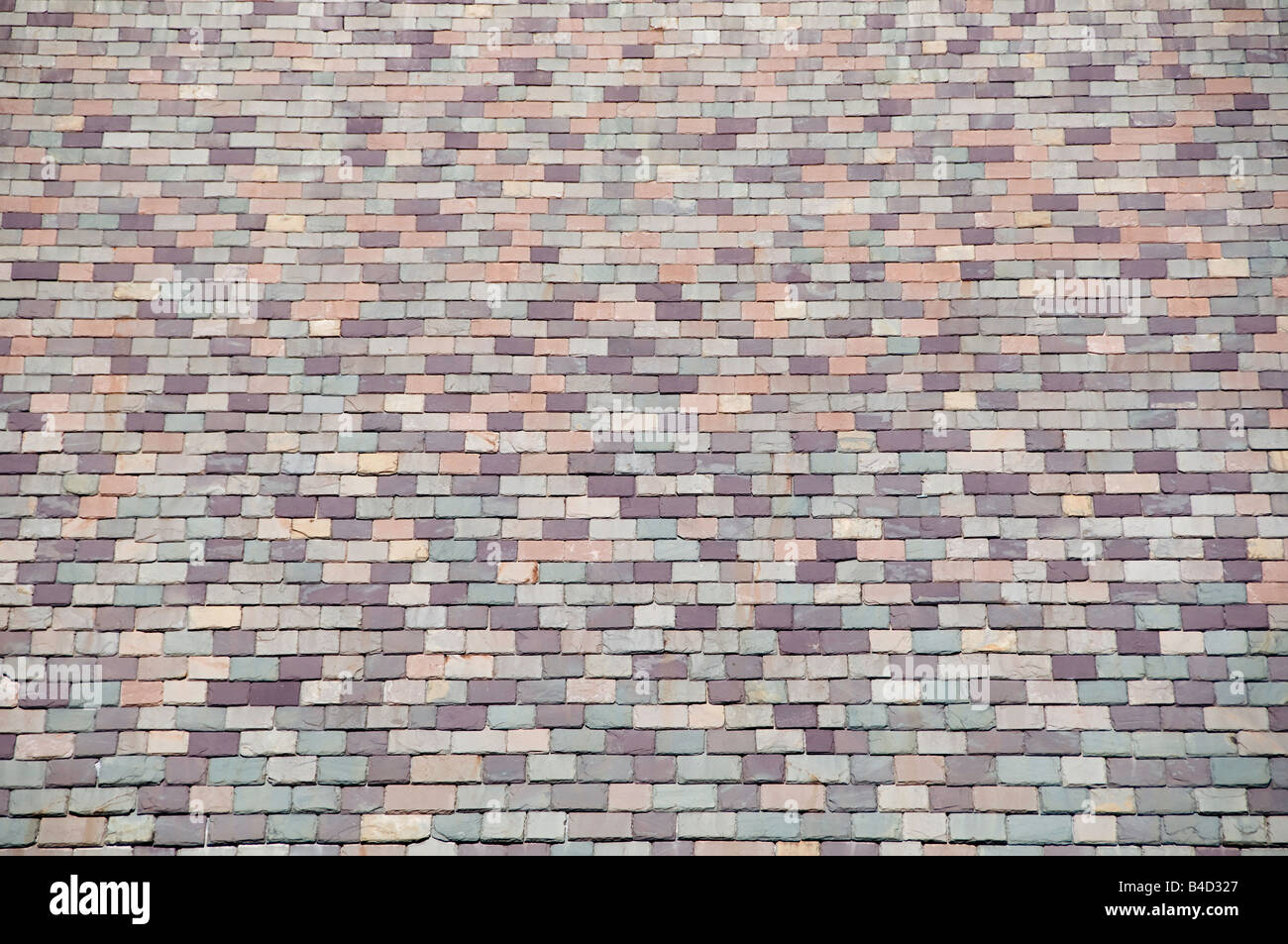 Mosaico di piastrelle in pietra sul tetto sul campus universitario Foto Stock