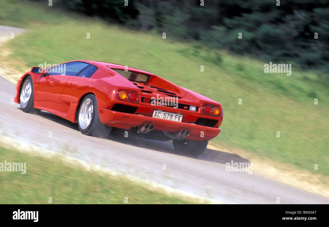 Auto Lamborghini Diablo VT, coupe/ Coupe, roadster, rosso, anno modello 1995, guida, diagonale dal retro, vista posteriore, vista laterale Foto Stock
