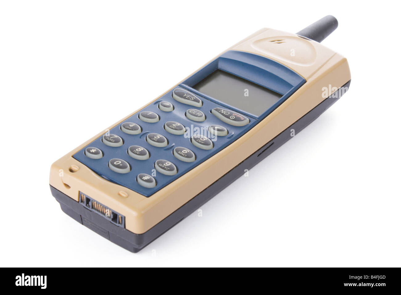 Vecchio telefono cellulare isolato su sfondo bianco Foto Stock