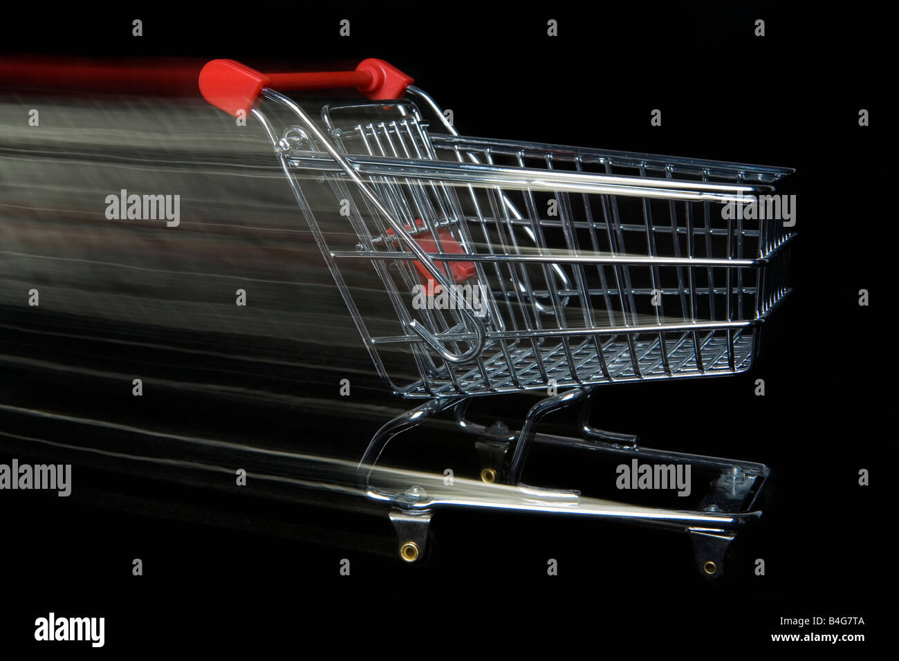 Una miniatura Svuota carrello in movimento, movimento sfocato Foto Stock