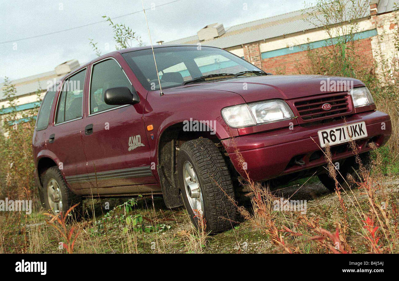 KIA SPORTAGE la trazione a 4 ruote motrici JEEP NOVEMBRE 1997 RECORD SU STRADA SUPPLEMENTO R671 UKK Foto Stock