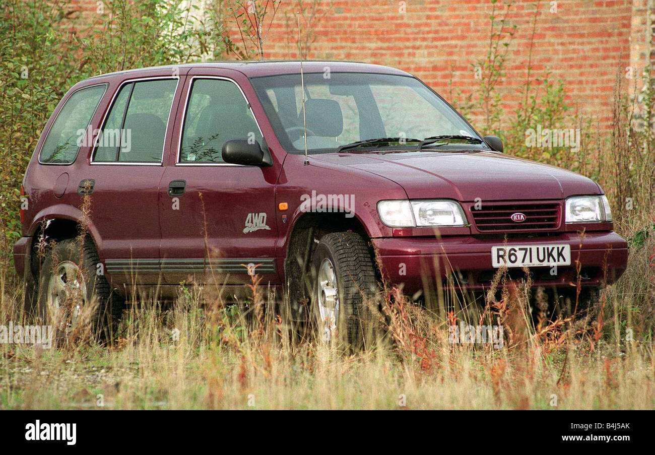 KIA SPORTAGE la trazione a 4 ruote motrici JEEP NOVEMBRE 1997 RECORD SU STRADA SUPPLEMENTO R671 UKK Foto Stock