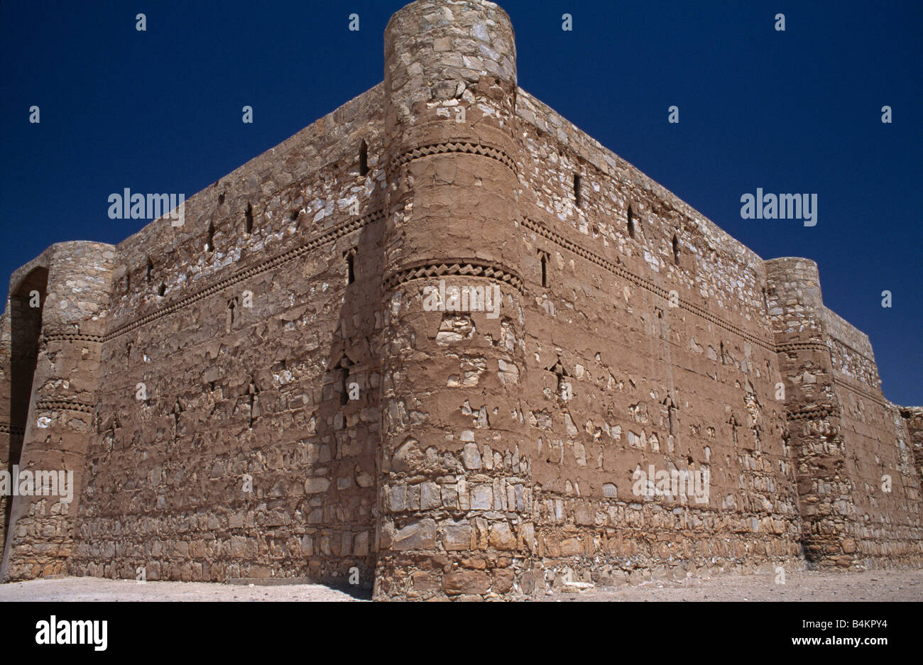 Il deserto omayyade castello di Qasr Al-Kharana, Giordania. Foto Stock
