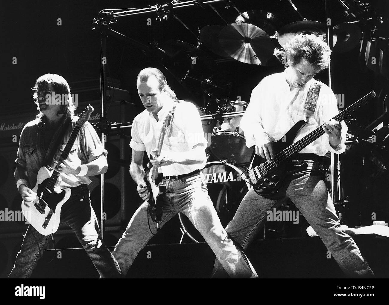 Status Quo Francesco Rossi cantante con Rick Parfitt e John Edwards circa 1995 Foto Stock