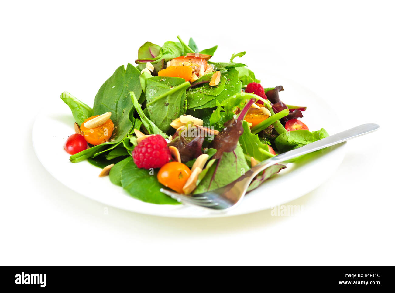 Piastra di fresco insalata verde isolato su sfondo bianco Foto Stock