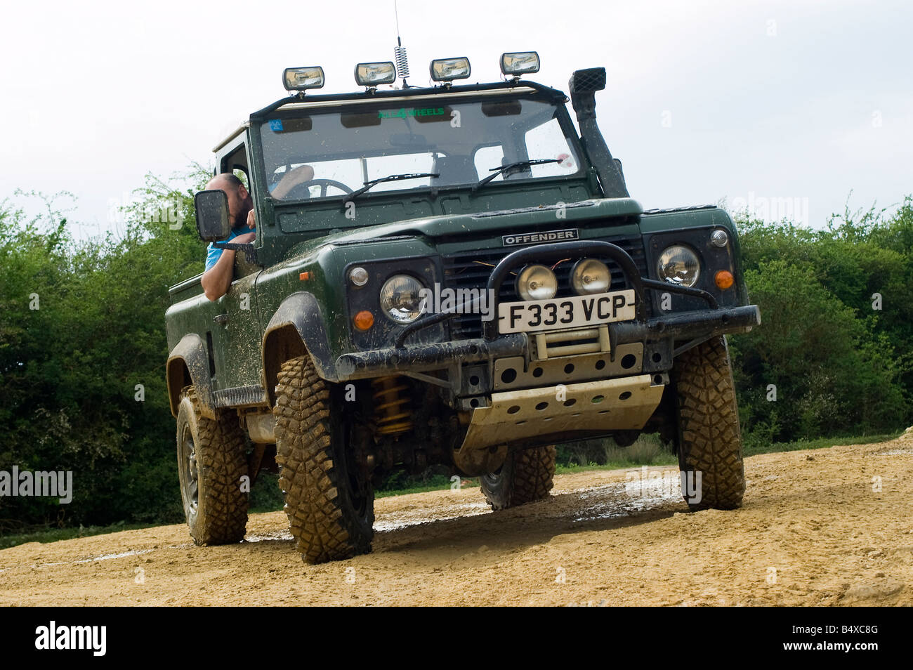 Land Rover Defender guida fuoristrada. Foto Stock