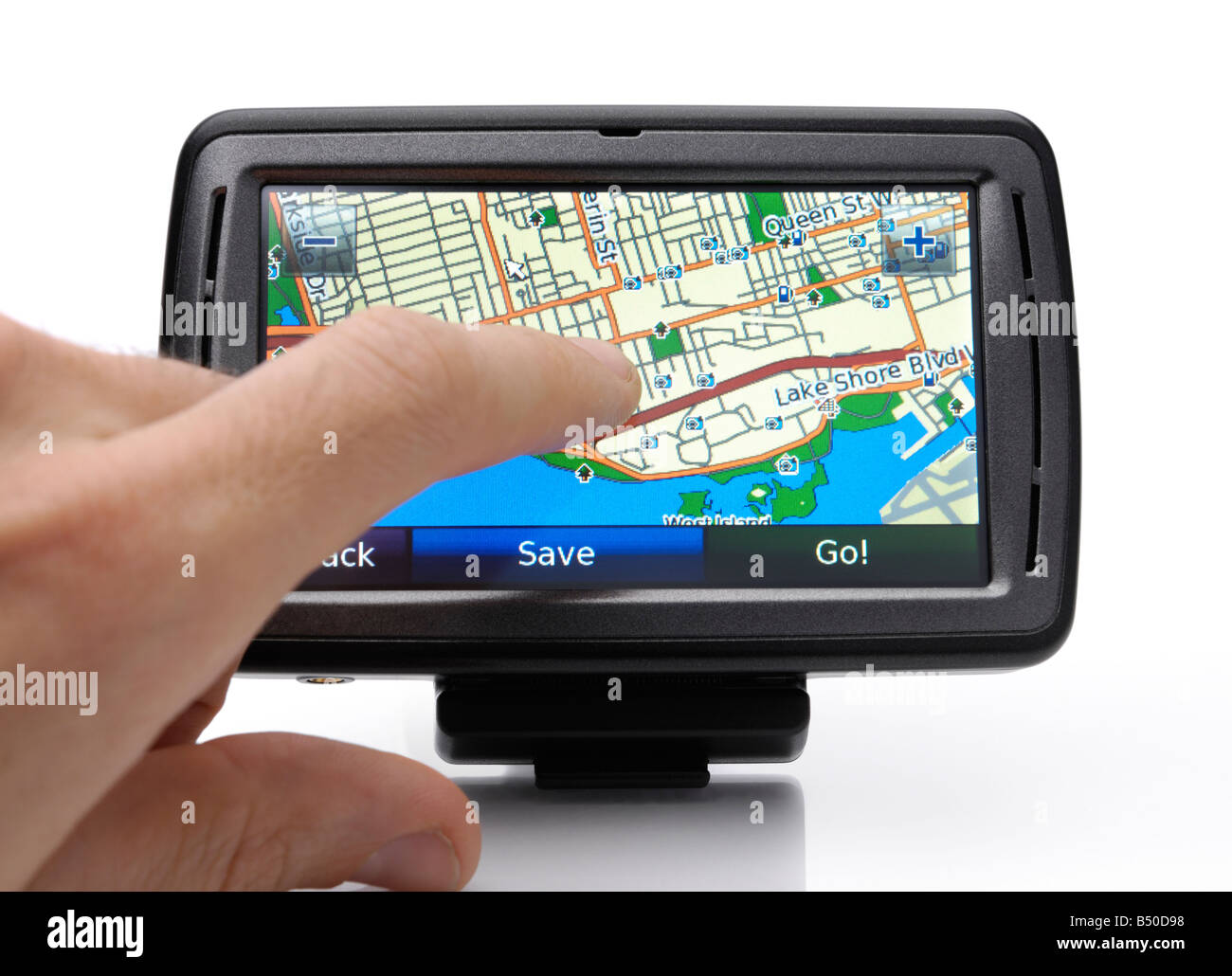 Persona navigazione automobilistica dispositivo GPS Foto Stock