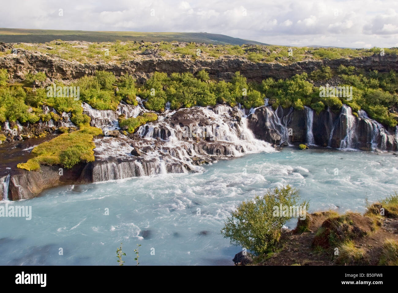 Wild Water a Hraunfossar, Islanda Foto Stock