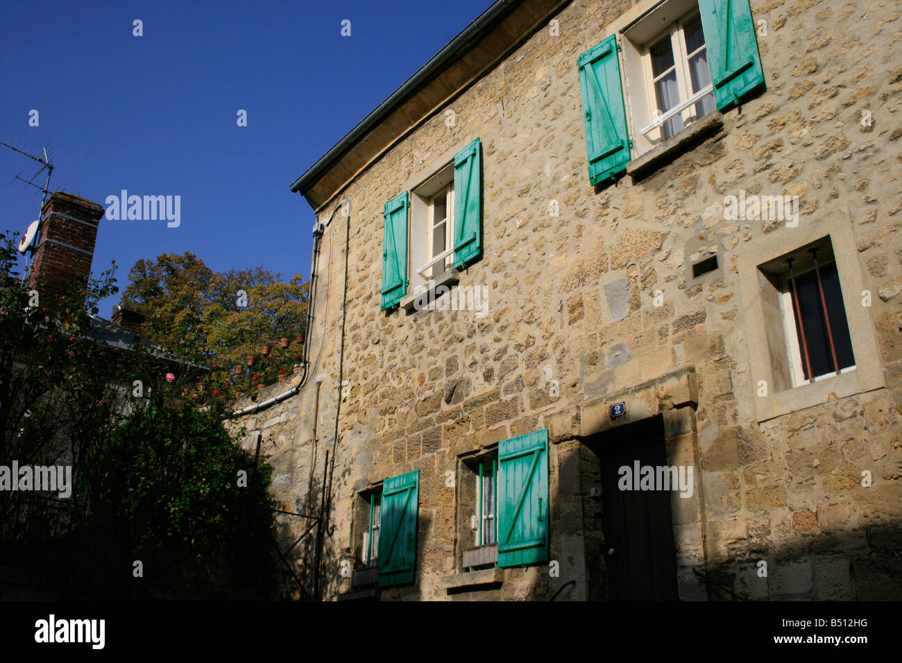 Vecchia casa vicino alla chiesa di Auvers sur Oise Foto Stock