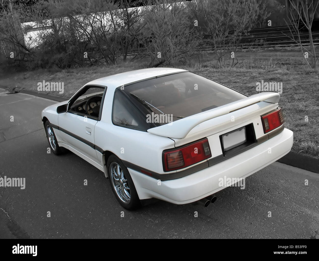 Un custom import sport auto parcheggiate sul lato della strada Foto Stock