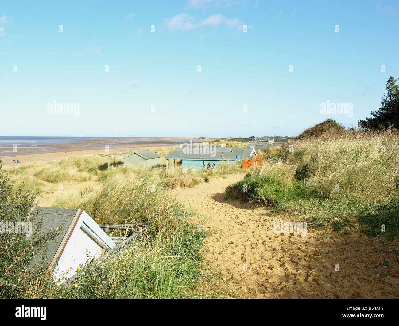 Spiaggia di legno case sulla spiaggia sabbiosa di sentiero costiero presso Old Hunstanton,Norfolk,East Anglia,uk. Foto Stock