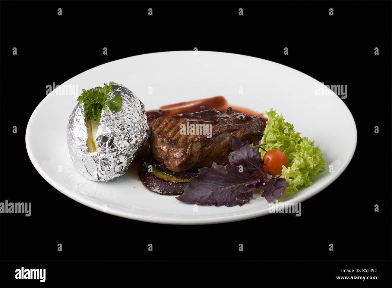 Bistecca di manzo cotta Foto Stock