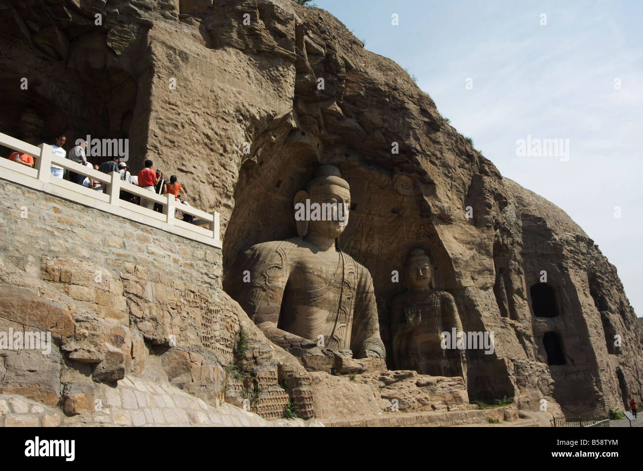 Statue buddiste di le grotte di Yungang tagliata durante il Northern Wei Dynasty in ANNUNCIO 460 nei pressi di Datong, nella provincia di Shanxi, Cina Foto Stock