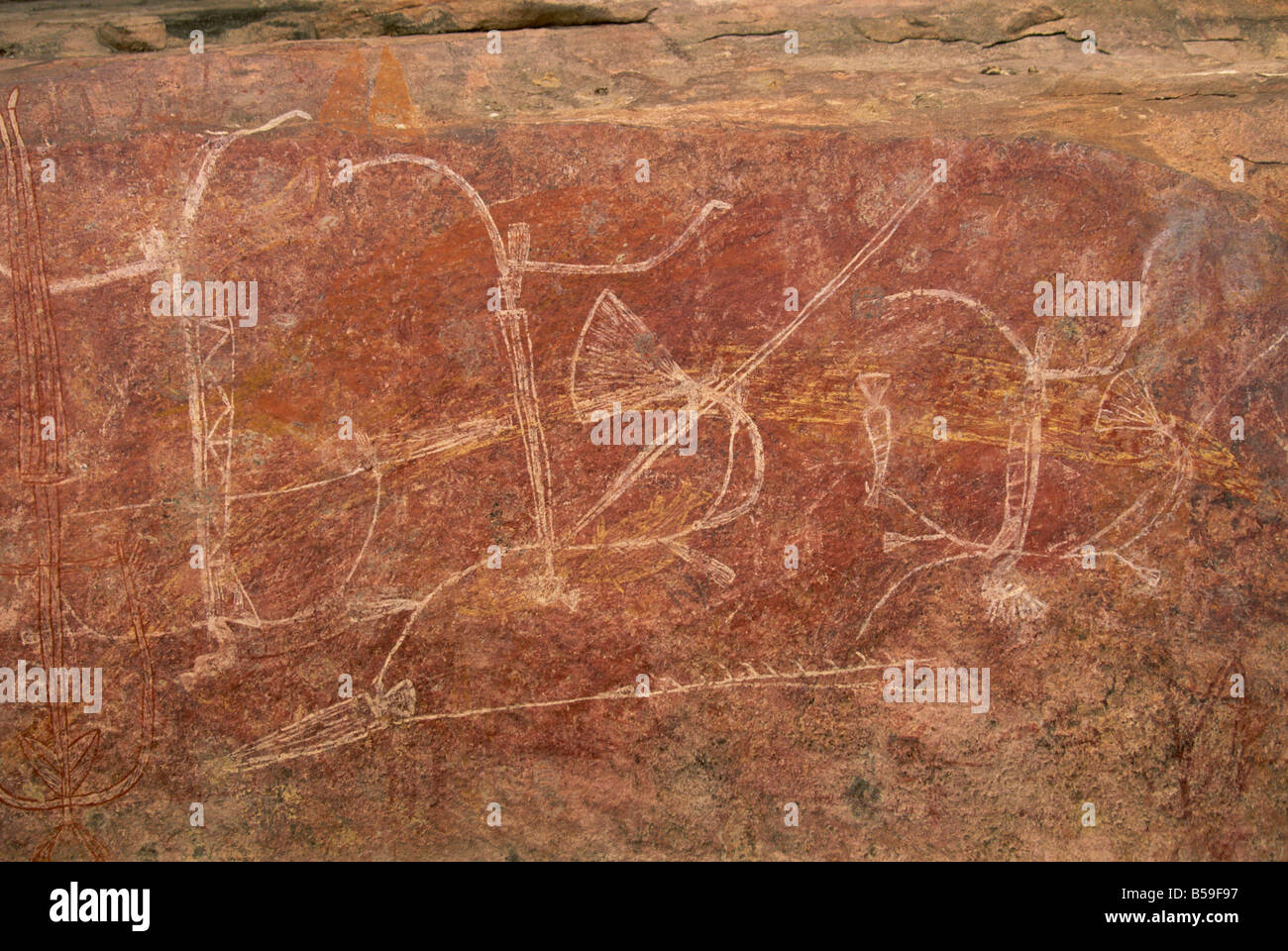 Warrior il fregio all'arte rupestre degli Aborigeni sito a Ubirr Rock, il Parco Nazionale Kakadu, Territorio del Nord, l'Australia Foto Stock