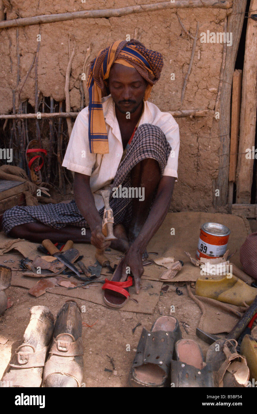 Calzolaio, Ouogane Camp, Somalia, Africa Foto Stock