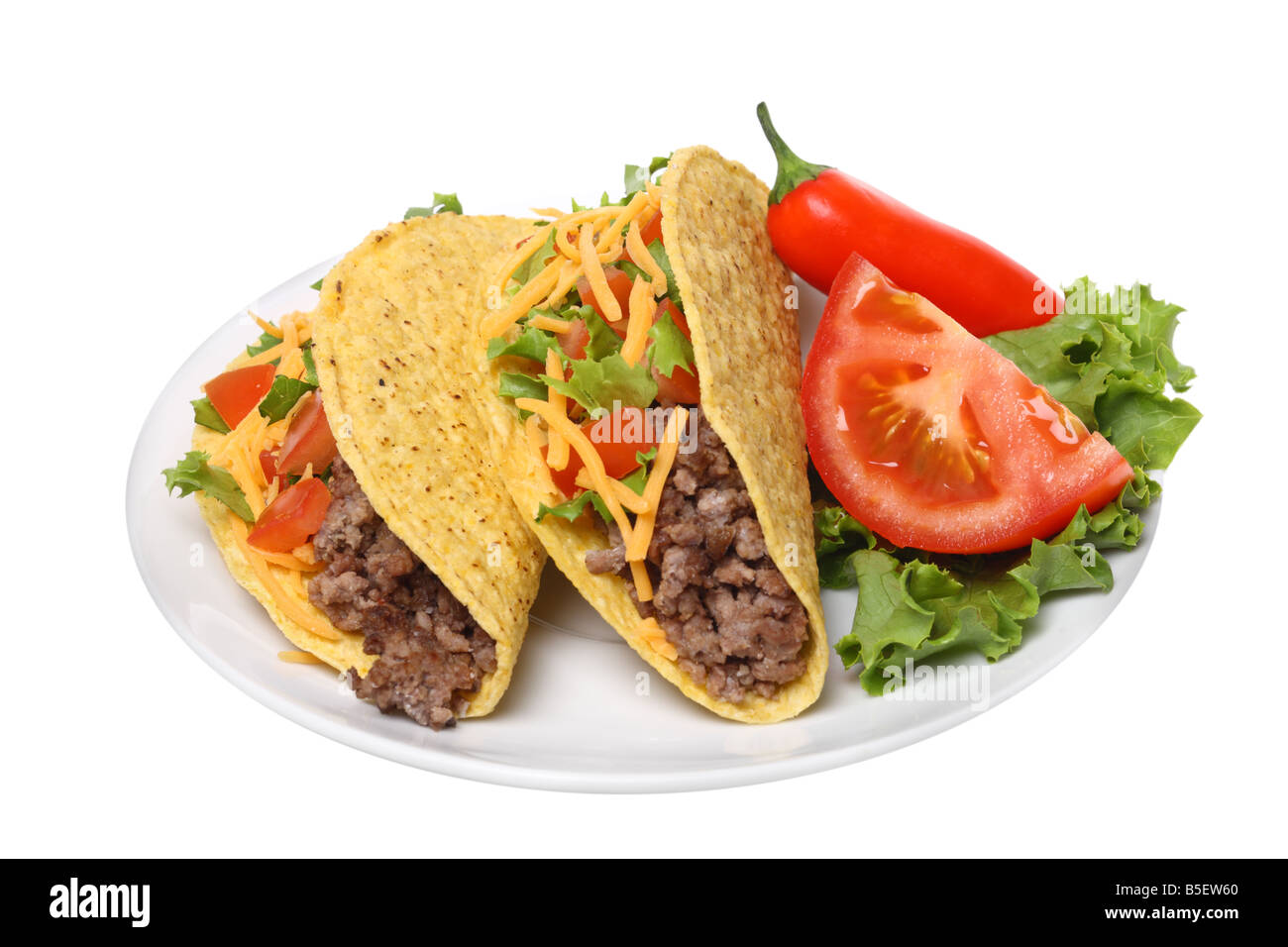 Piastra con tacos intaglio su sfondo bianco Foto Stock