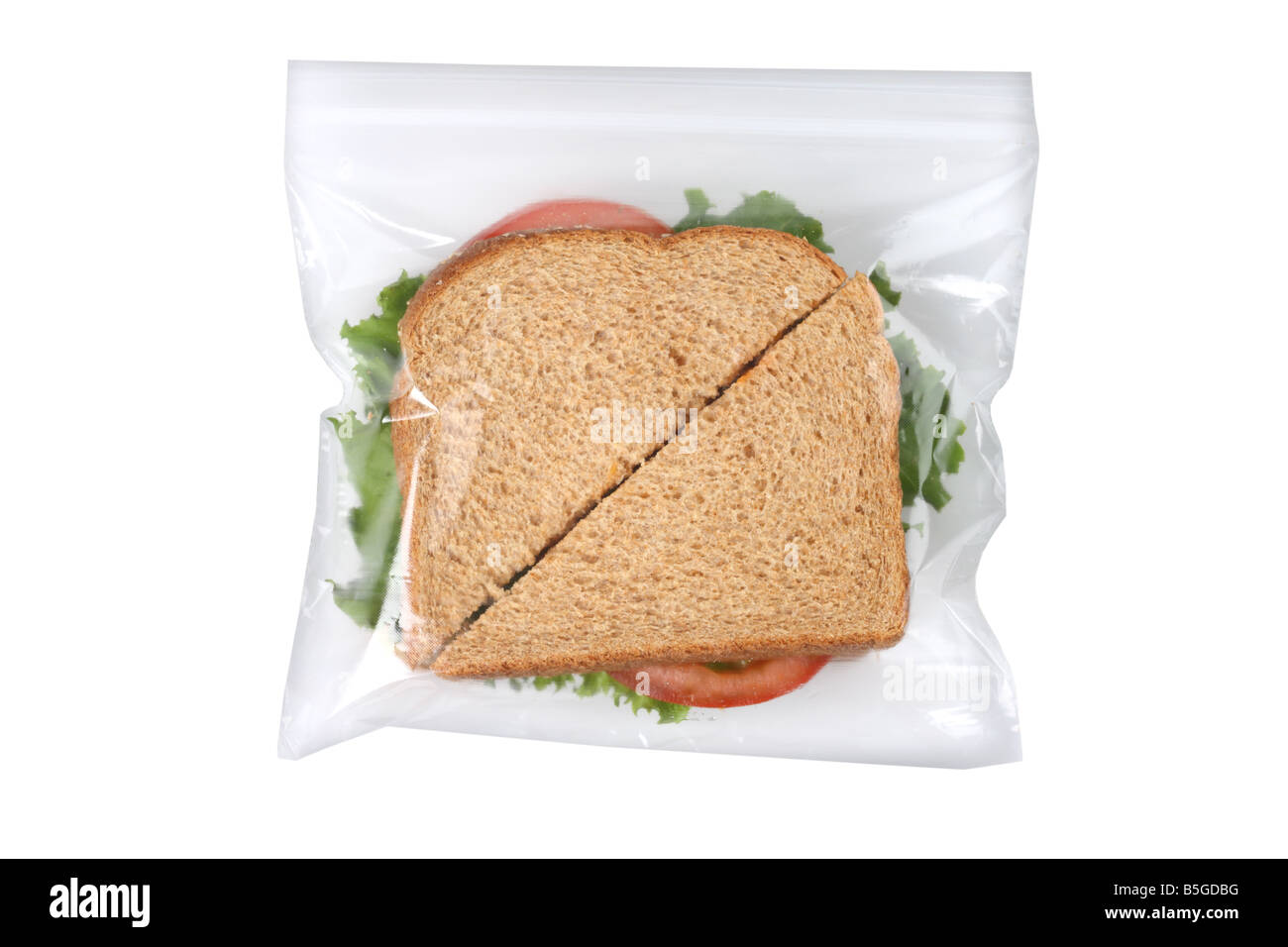 Sandwich nel sacchetto di plastica intaglio su sfondo bianco Foto Stock