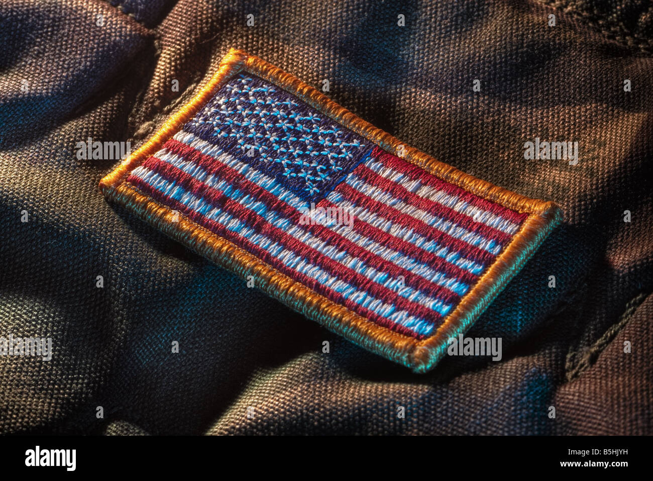 Ci staccabile bandiera patch sul militare tessuto camouflage Foto Stock