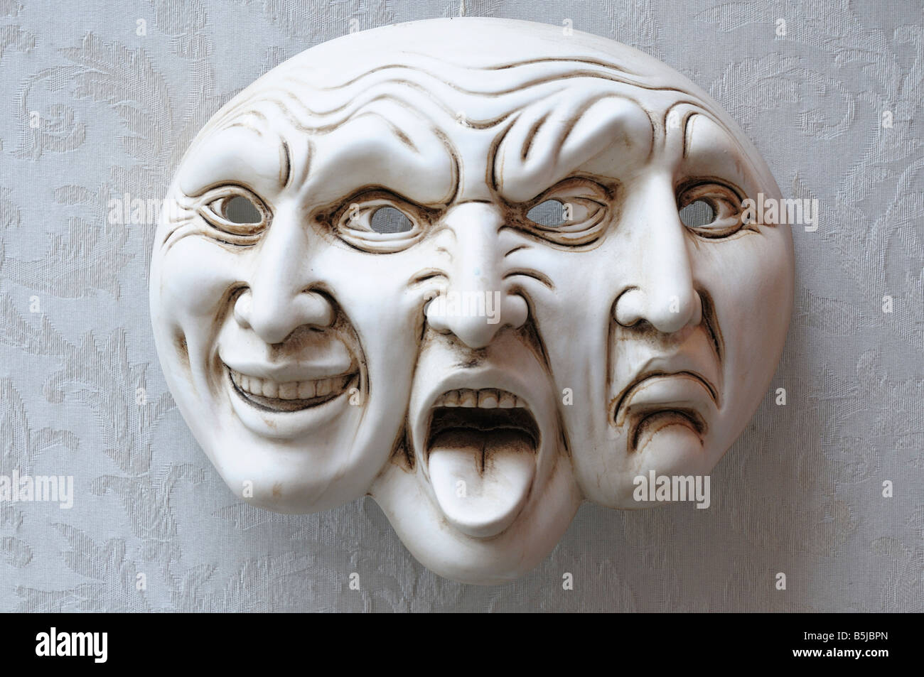 Trifaccia. Tre facce maschera, mostrando la commedia, la tragedia e rabbia, tradizionale maschera di Carnevale di Venezia. Foto Stock