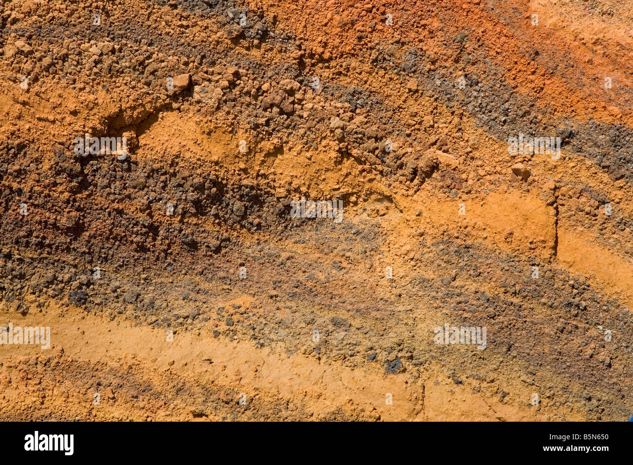 Rosso e arancione di rocce vulcaniche Foto Stock