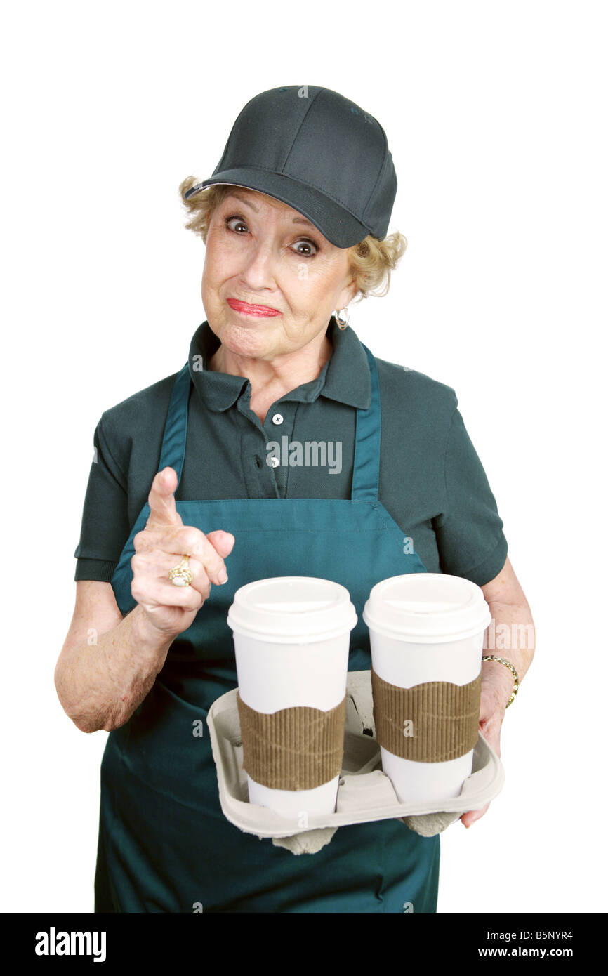 Un lavoratore senior in un coffee shop con rabbia di fronte a un cliente difficile Foto Stock