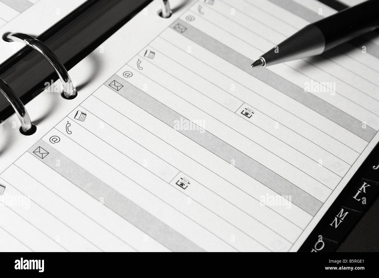 Aprire organizer con penna pagina vuota Foto Stock