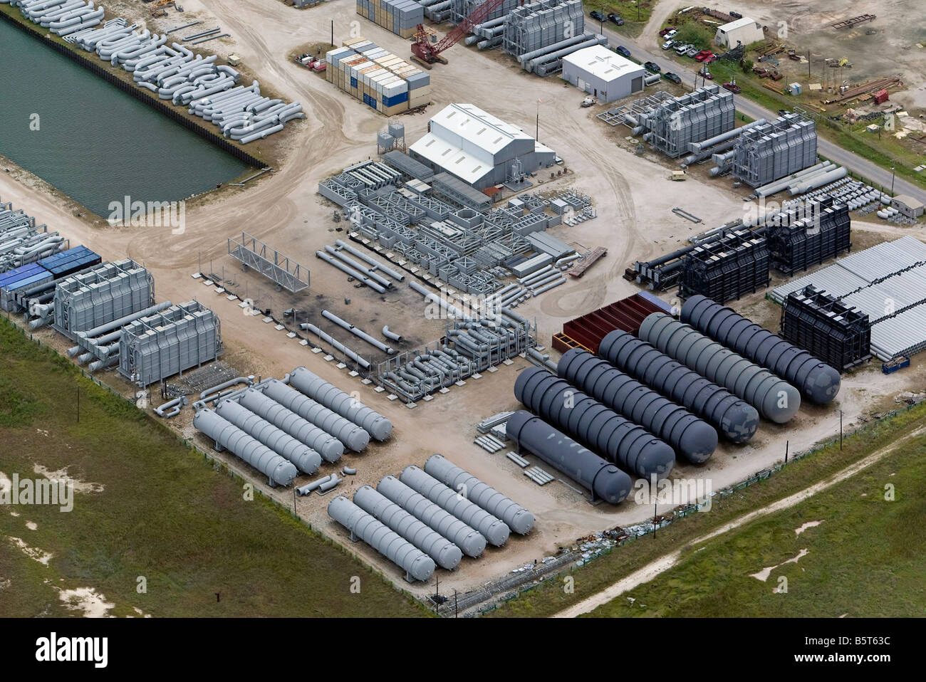 Vista aerea al di sopra dei materiali da costruzione per impianti di trivellazione del petrolio Texas Golfo del Messico Foto Stock