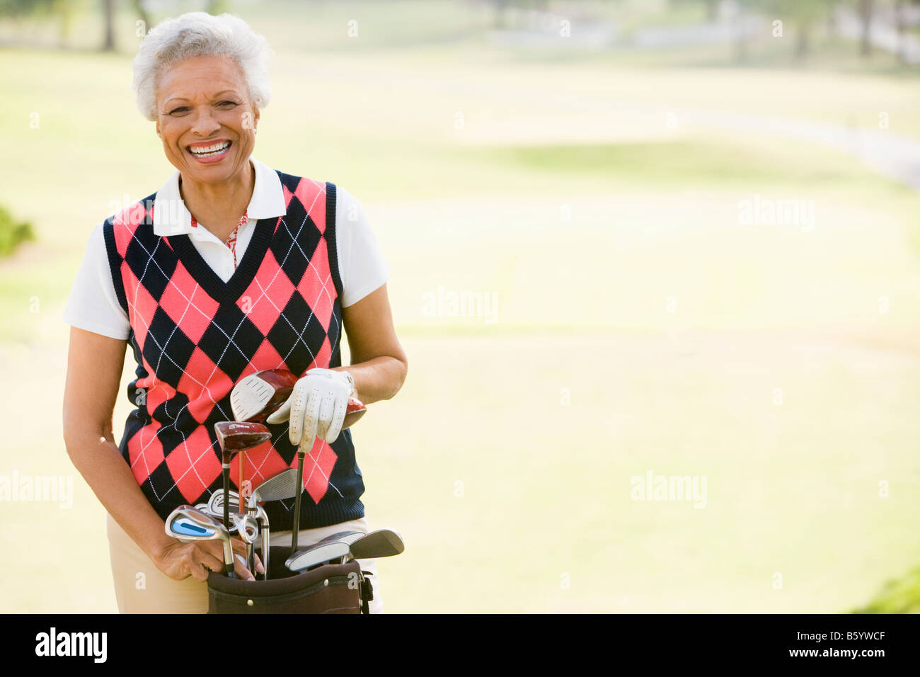 Ritratto di un giocatore di golf femminile Foto Stock