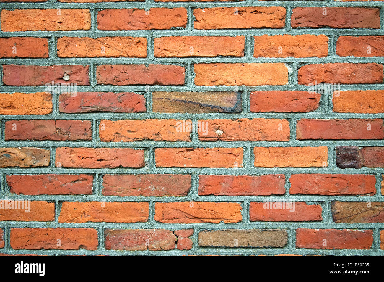 La texture e il vecchio muro di mattoni colorati Foto Stock