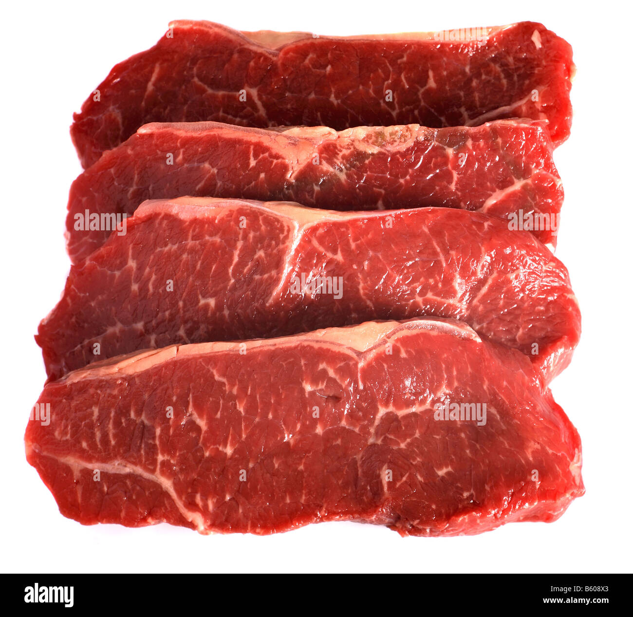 4 bistecche di controfiletto, noto anche come 'delmonico steak" "Kansas City steak' 'strip steak' 'shell' bistecca 'new york steak' e 'por Foto Stock