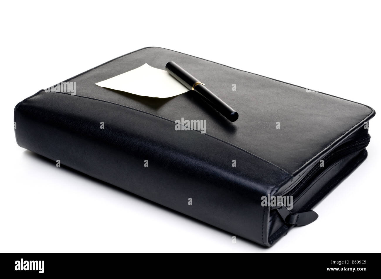 Pianificatore di giorno con una nota vuota e penna Foto Stock