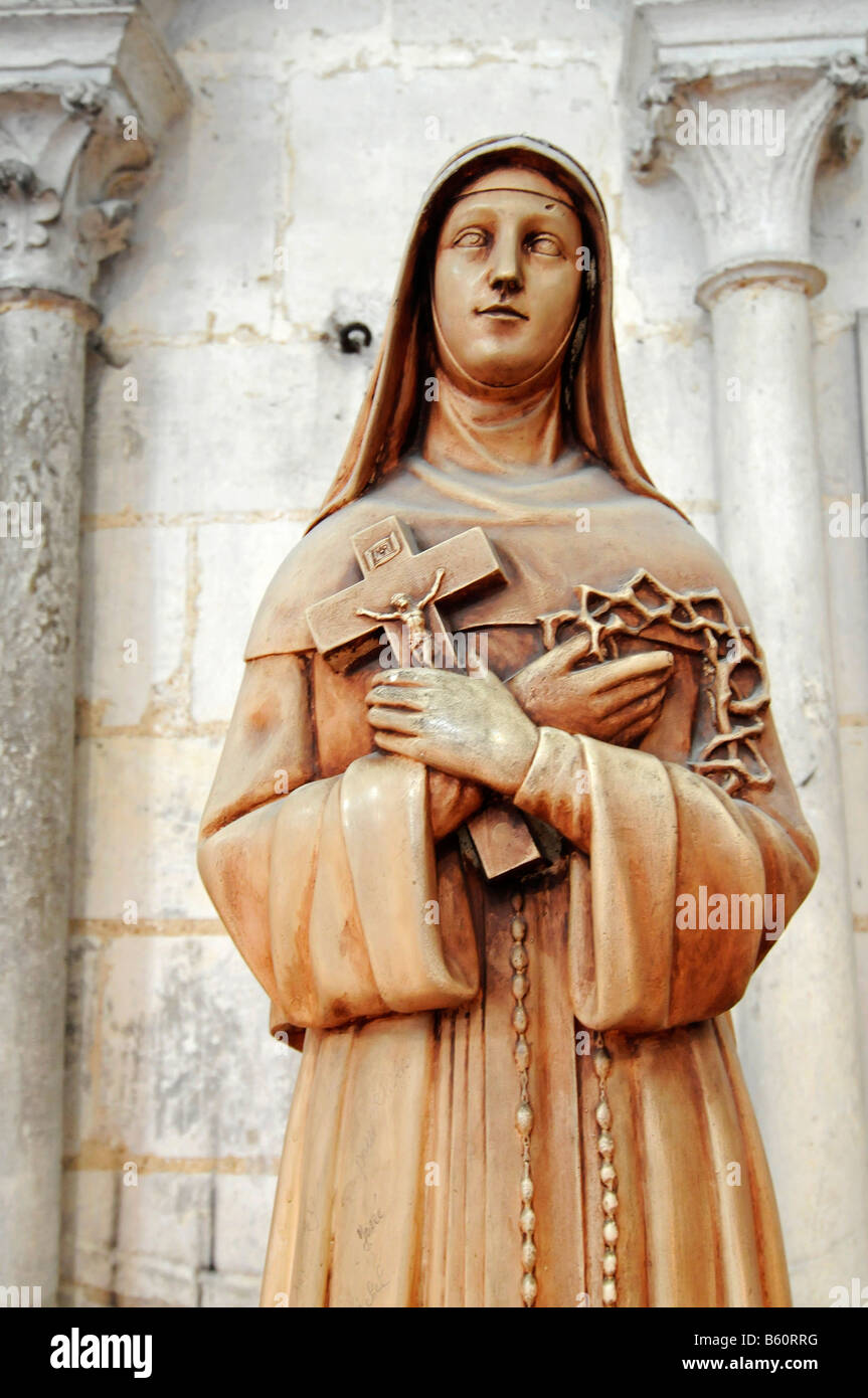 Croce, santi statua, occhi non vedenti, la cattedrale di Notre Dame, Amiens, Picardia, Francia, Europa Foto Stock