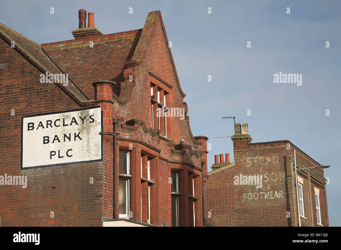 Barclays Bank plc a segno su edificio di mattoni rossi Lowestoft Suffolk in Inghilterra Foto Stock