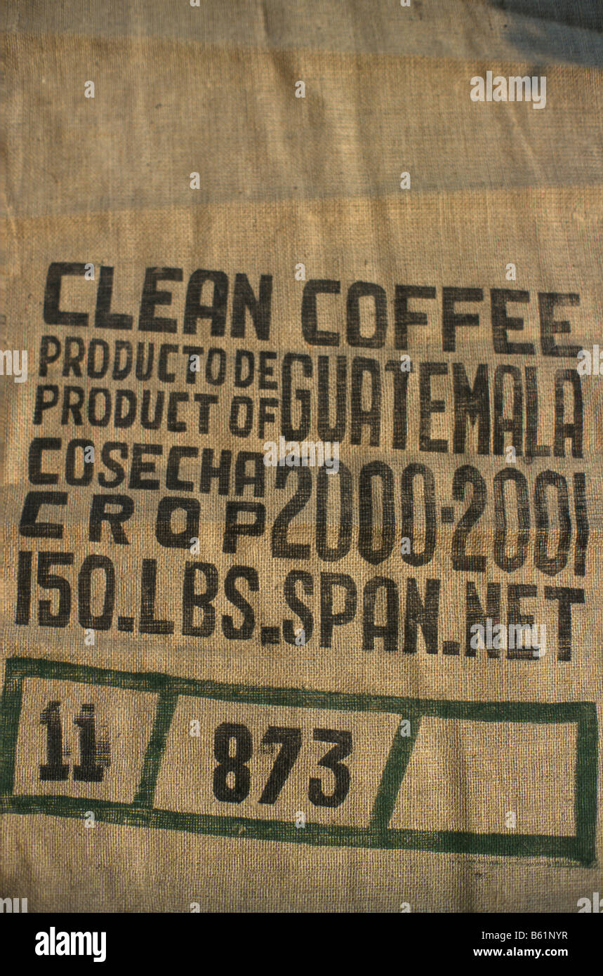 Una stampata di iuta sacchetto utilizzato per lo stoccaggio e il trasporto di caffè verde Guatemala Foto Stock