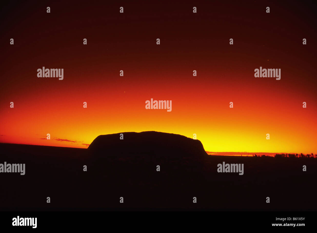 Uluru Ayers Rock al sunrise, Northern Territory, Australien Foto Stock