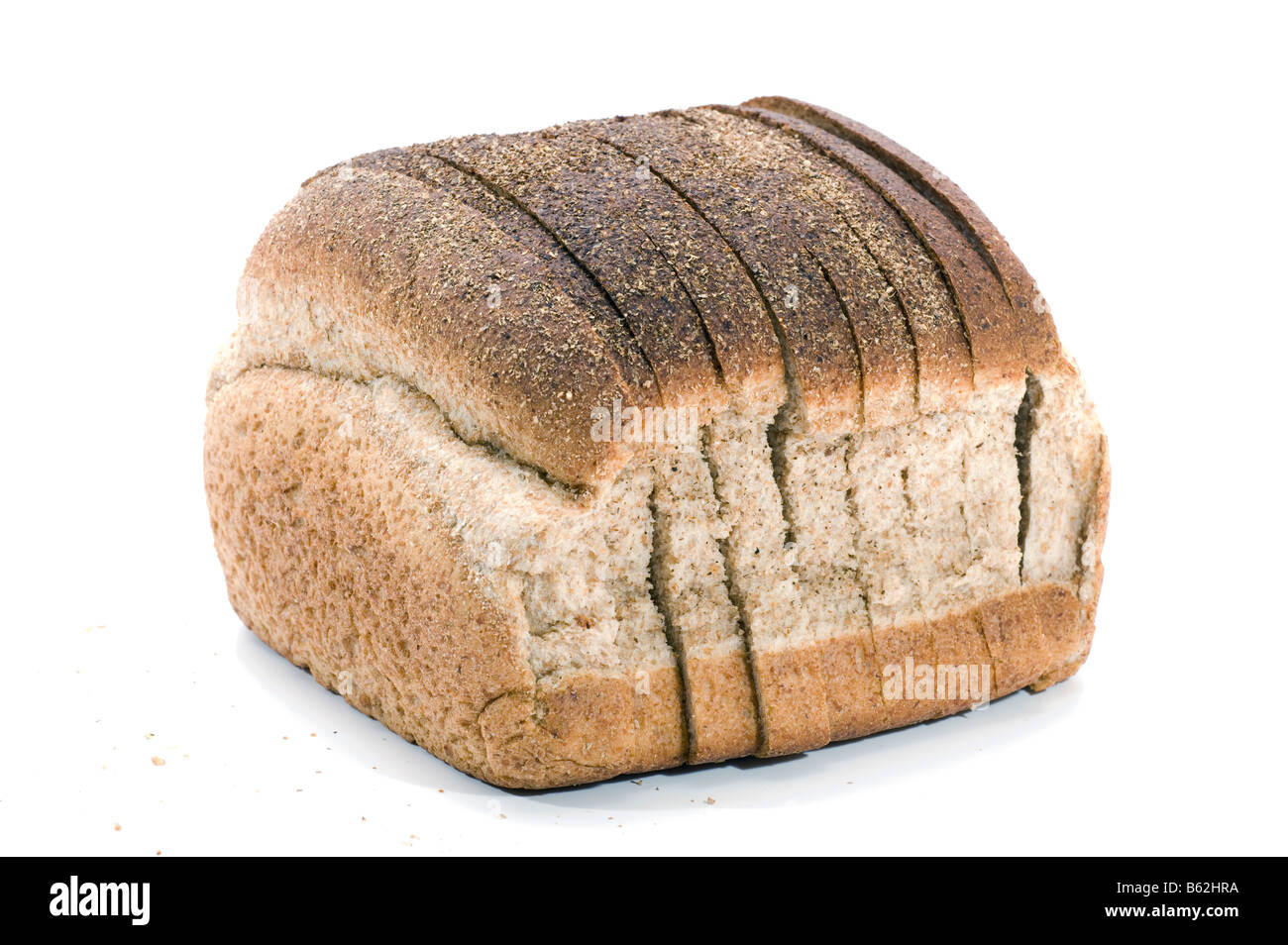 La metà di un pane di segale e briciole Foto Stock