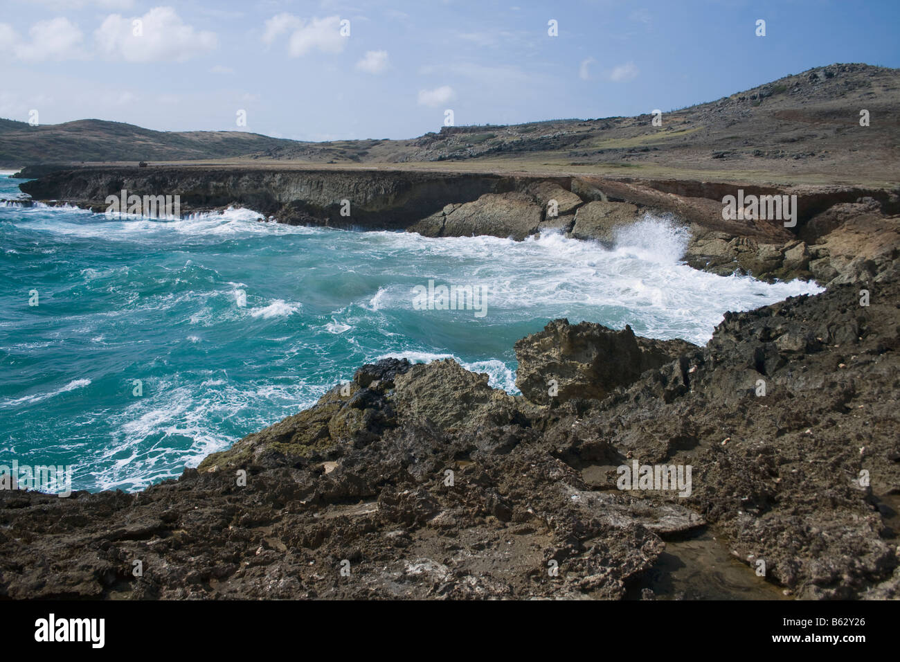 Il robusto entroterra di Aruba la costa nord est vicino al crollo di Ponte naturale. Foto Stock