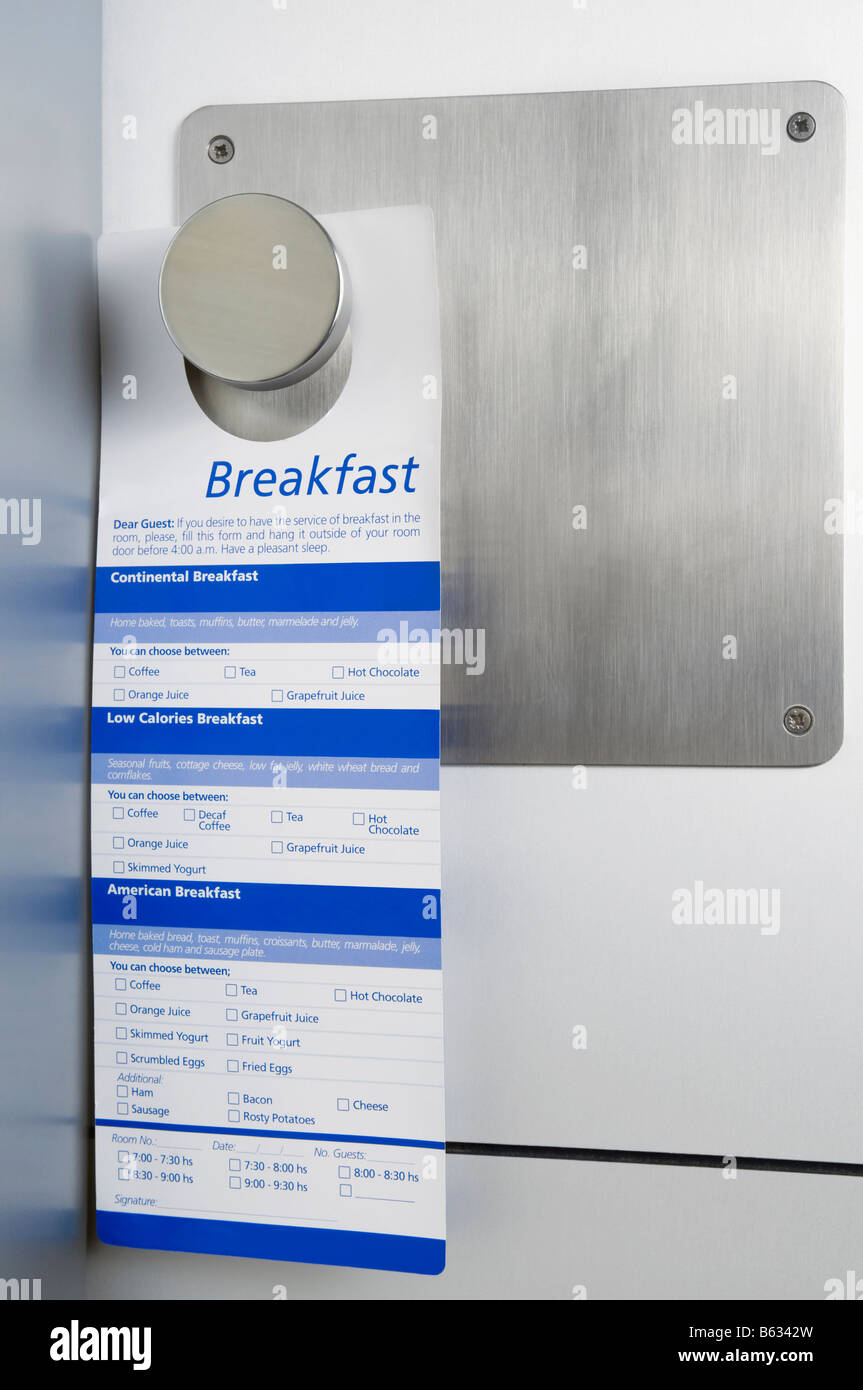 Il menu della prima colazione appeso a una maniglia Foto Stock