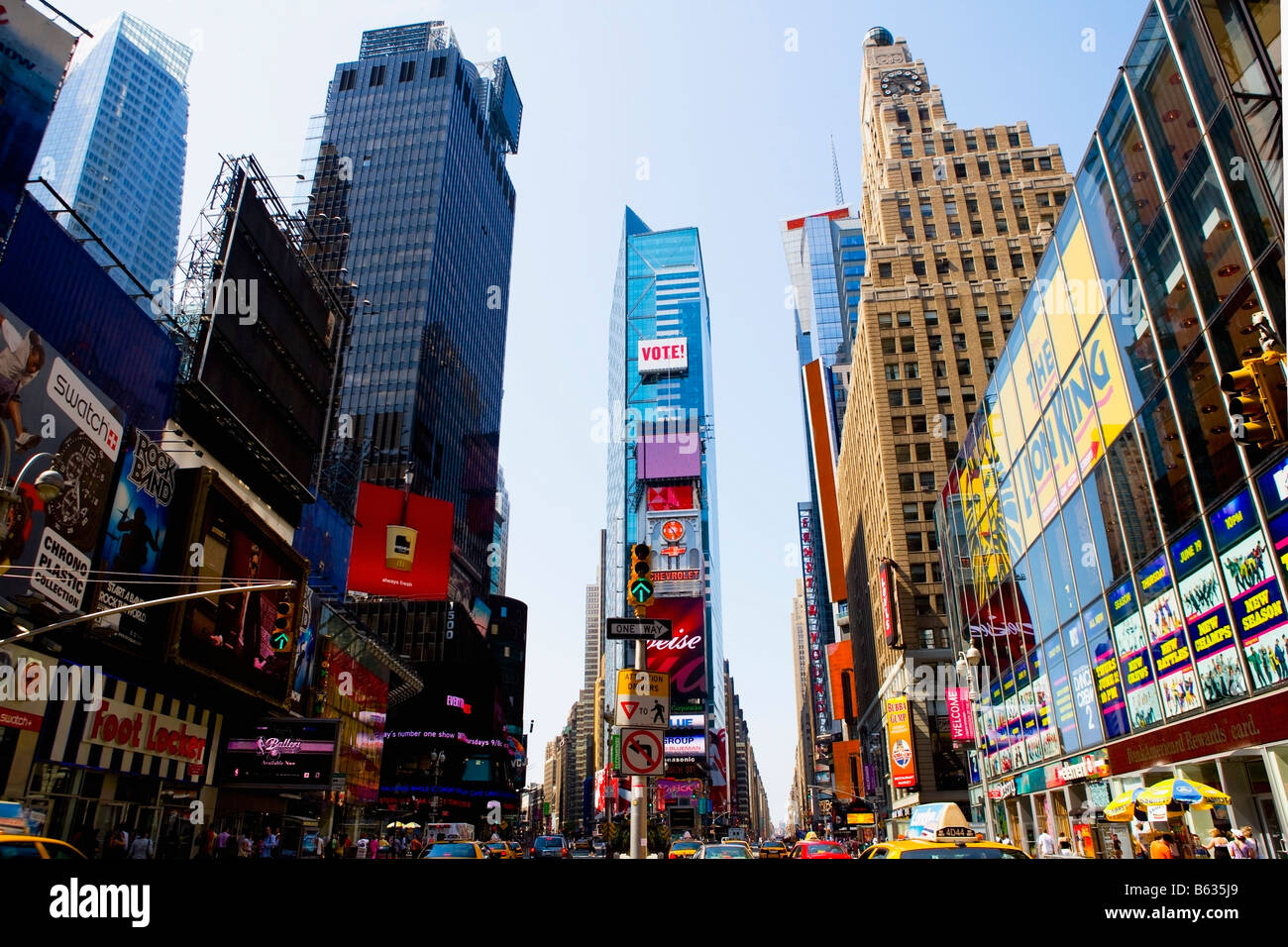 Insegne commerciali su edifici, Times Square Manhattan, New York City, nello Stato di New York, Stati Uniti d'America Foto Stock