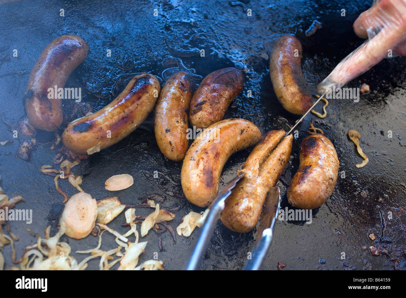 Australia, Sydney, South West Wales. Manly Beach Barbeque. Salsicce. Foto Stock