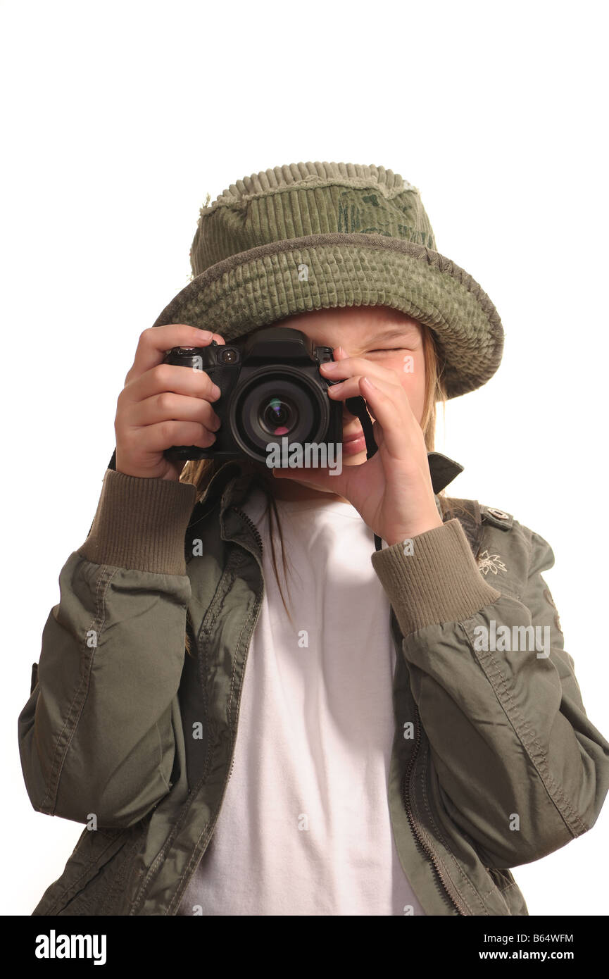Ragazza giovane con la reflex digitale come fotocamera digitale Foto Stock
