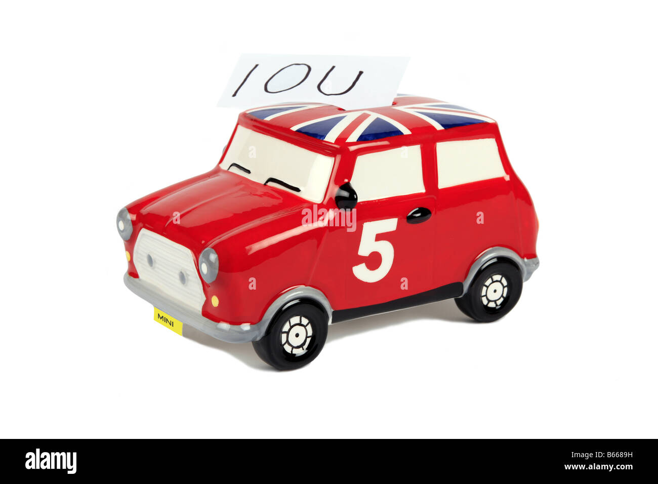 A British Leyland Red Mini Salvadanaio con un IOU Foto Stock