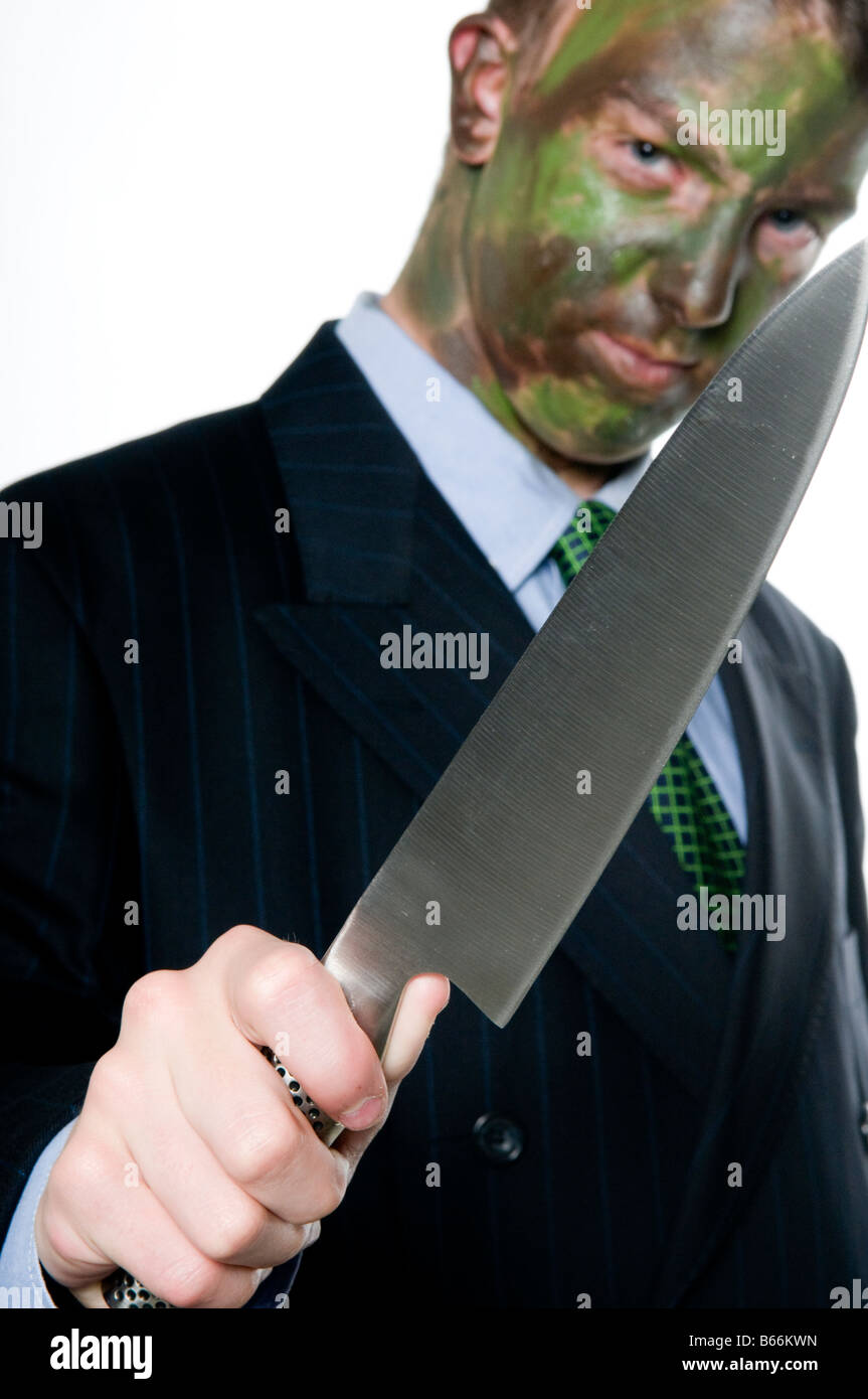 Guerriero aziendale con il coltello Foto Stock