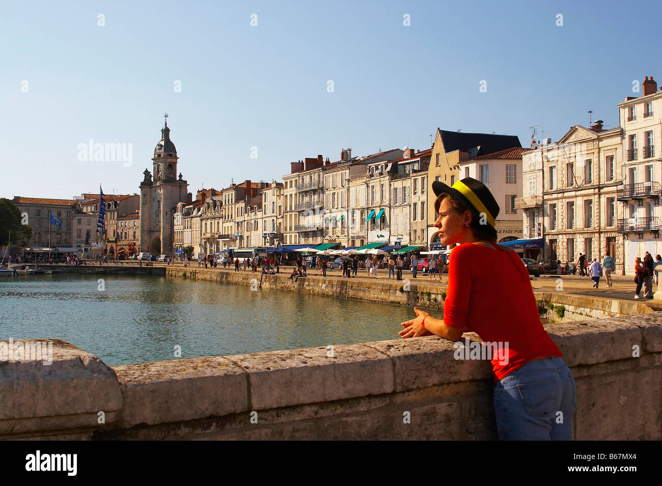 Grosse Horloge e case borghesi al vecchio porto di La Rochelle, Charente-Vendée, dept Charente-Maritime, Francia, Europa Foto Stock