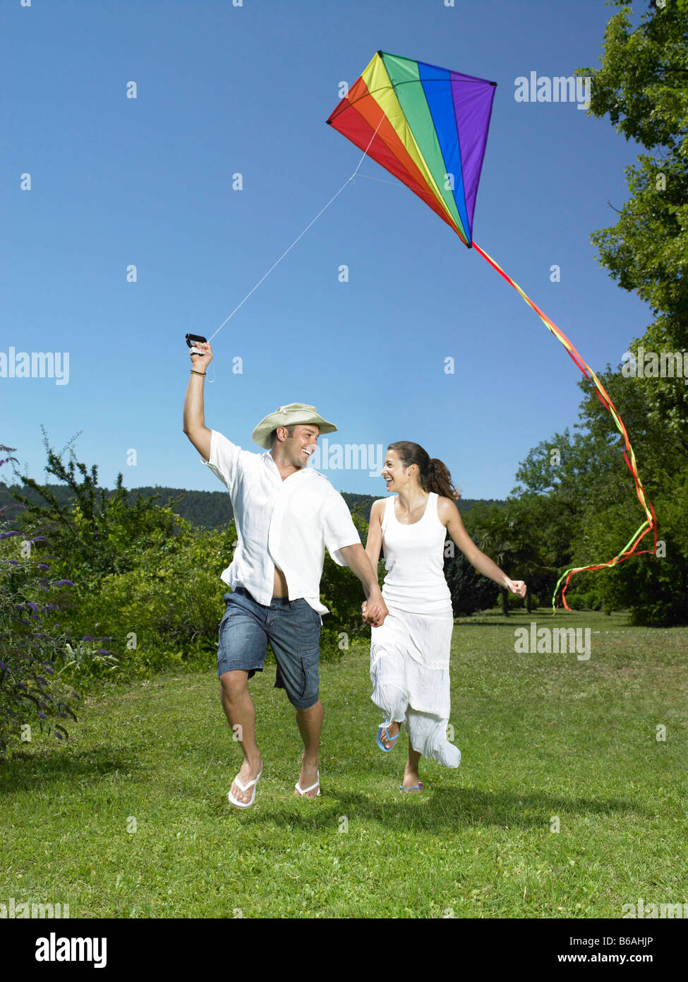 L uomo e la donna aquilone volante Foto Stock