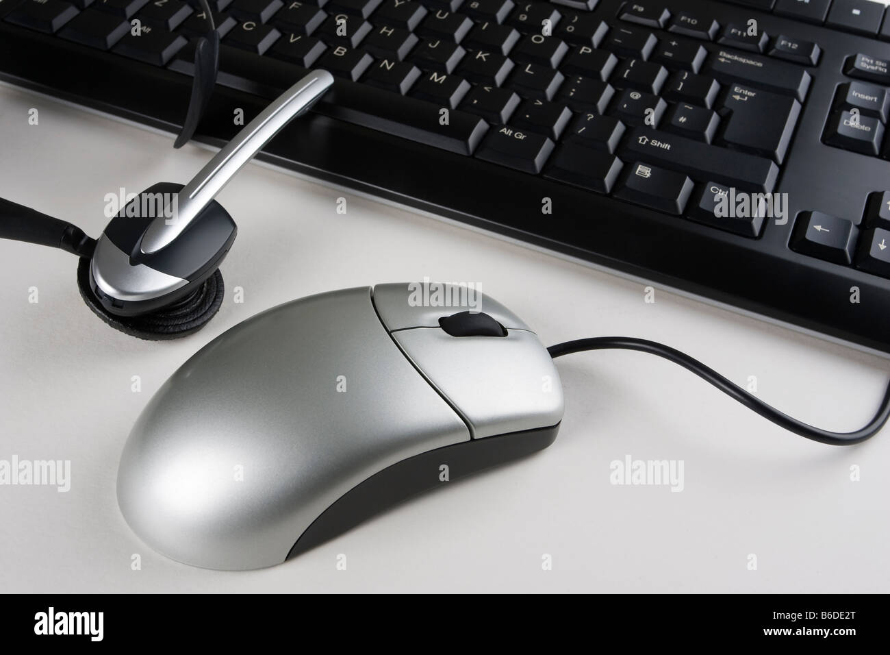 Un auricolare di helpdesk per tastiera e mouse Foto Stock