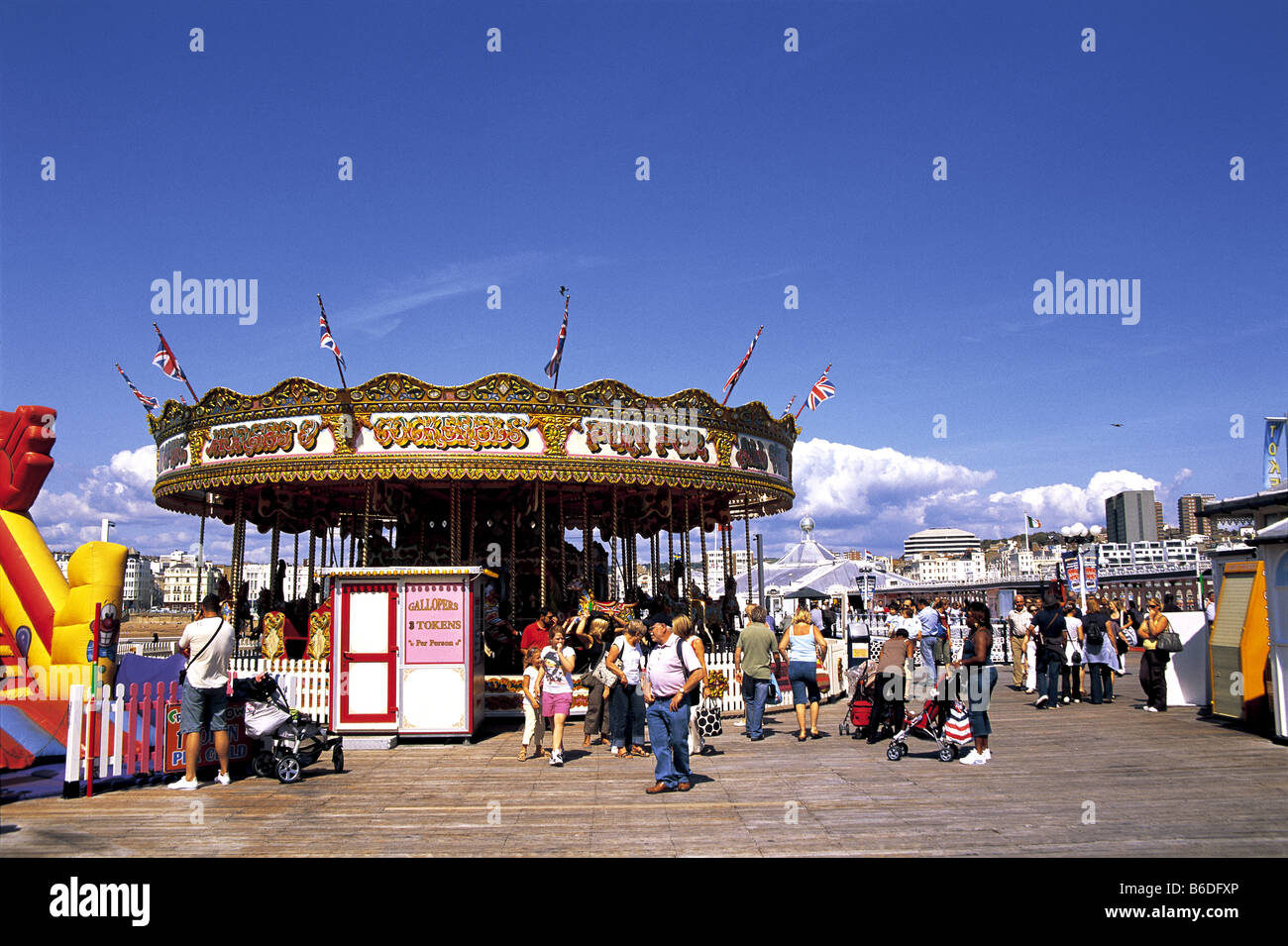 Giostra sul molo di Brighton nel Sussex, Inghilterra Foto Stock