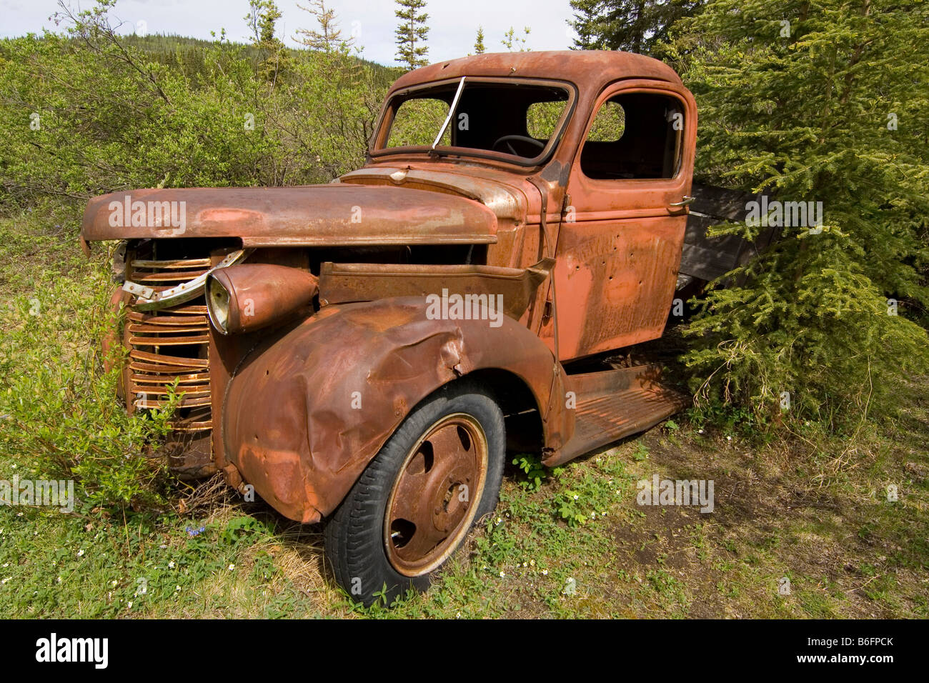 Il legno vecchio carrello, arrugginiti, inferiore Laberge Village, Yukon Territory, Canada, America del Nord Foto Stock
